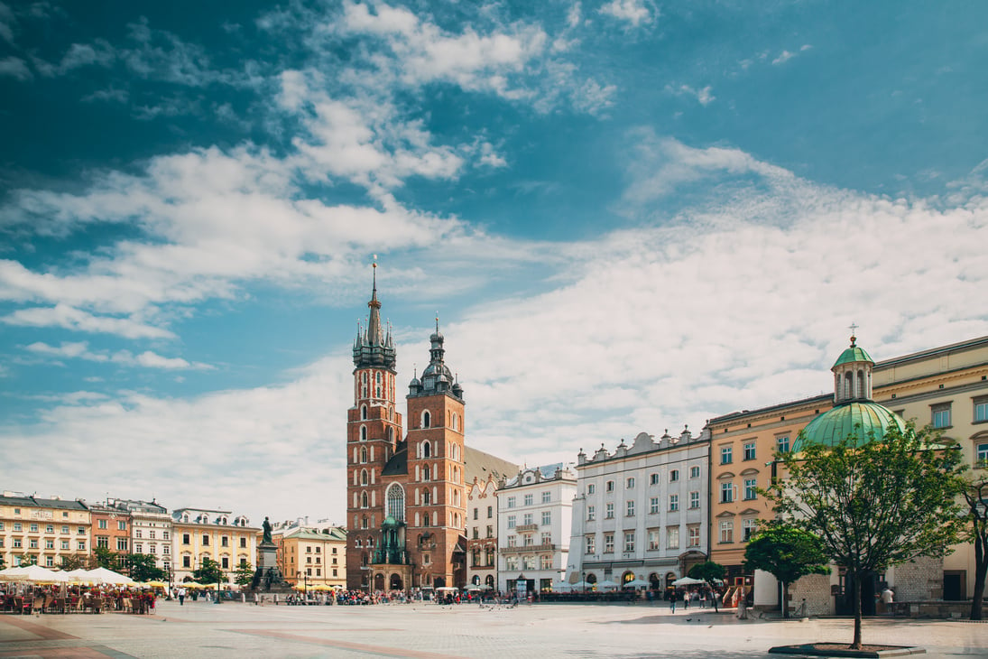 Krakow, Poland. St. Mary's Basilica And Cloth Hall Building.